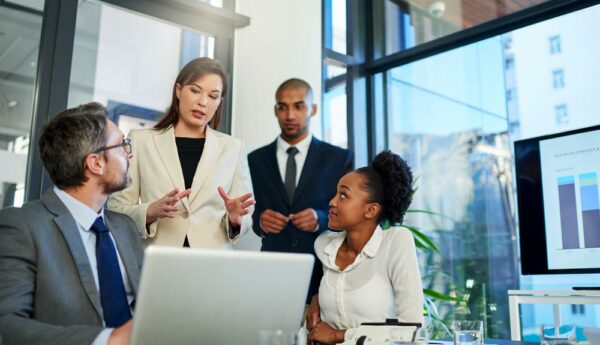 Law firm professionals using technology and standardized processes to improve efficiency and reduce professional liability risk