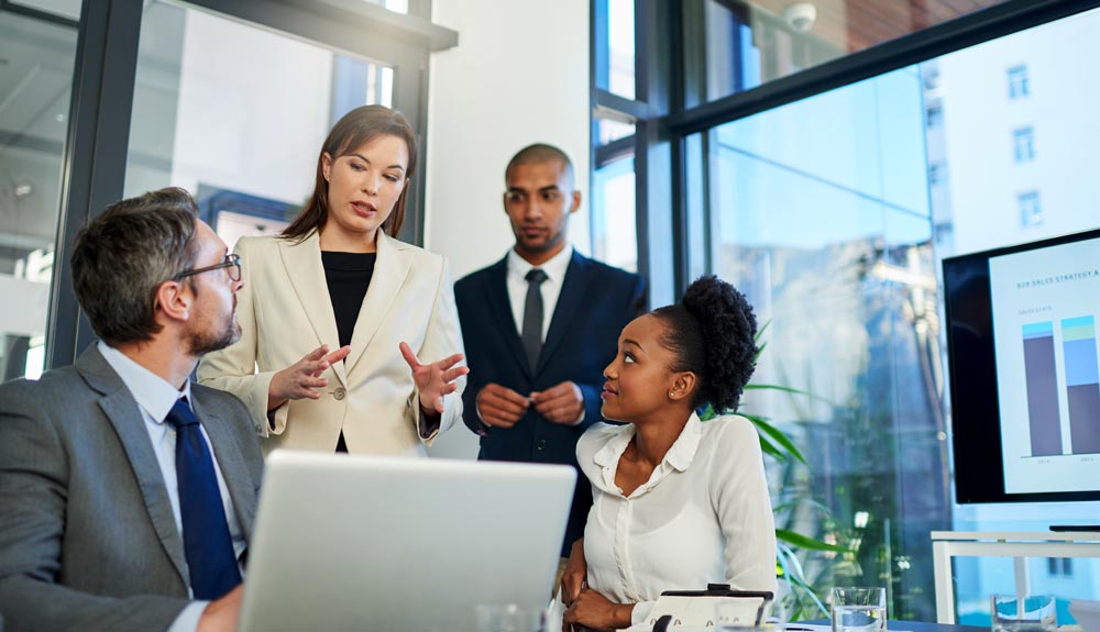 Law firm professionals using technology and standardized processes to improve efficiency and reduce professional liability risk