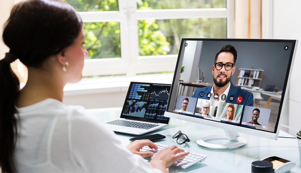 Attorney conducting legal work remotely while managing client information through secure digital technology
